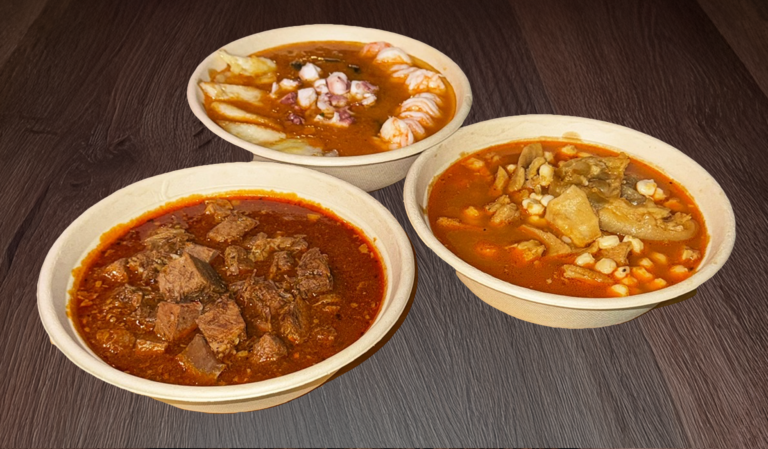 3 deliciously prepared soups sitting side by side on a table